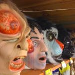 Variety of scary masks Selection inside the store for Halloween